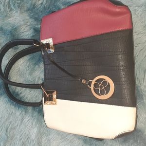 Pocket Book, Red/Black/White, Spacious, Lots of pockets. Comes with longer strap